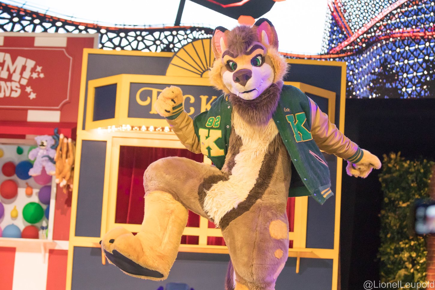 A photograph of a fursuiter dancing.