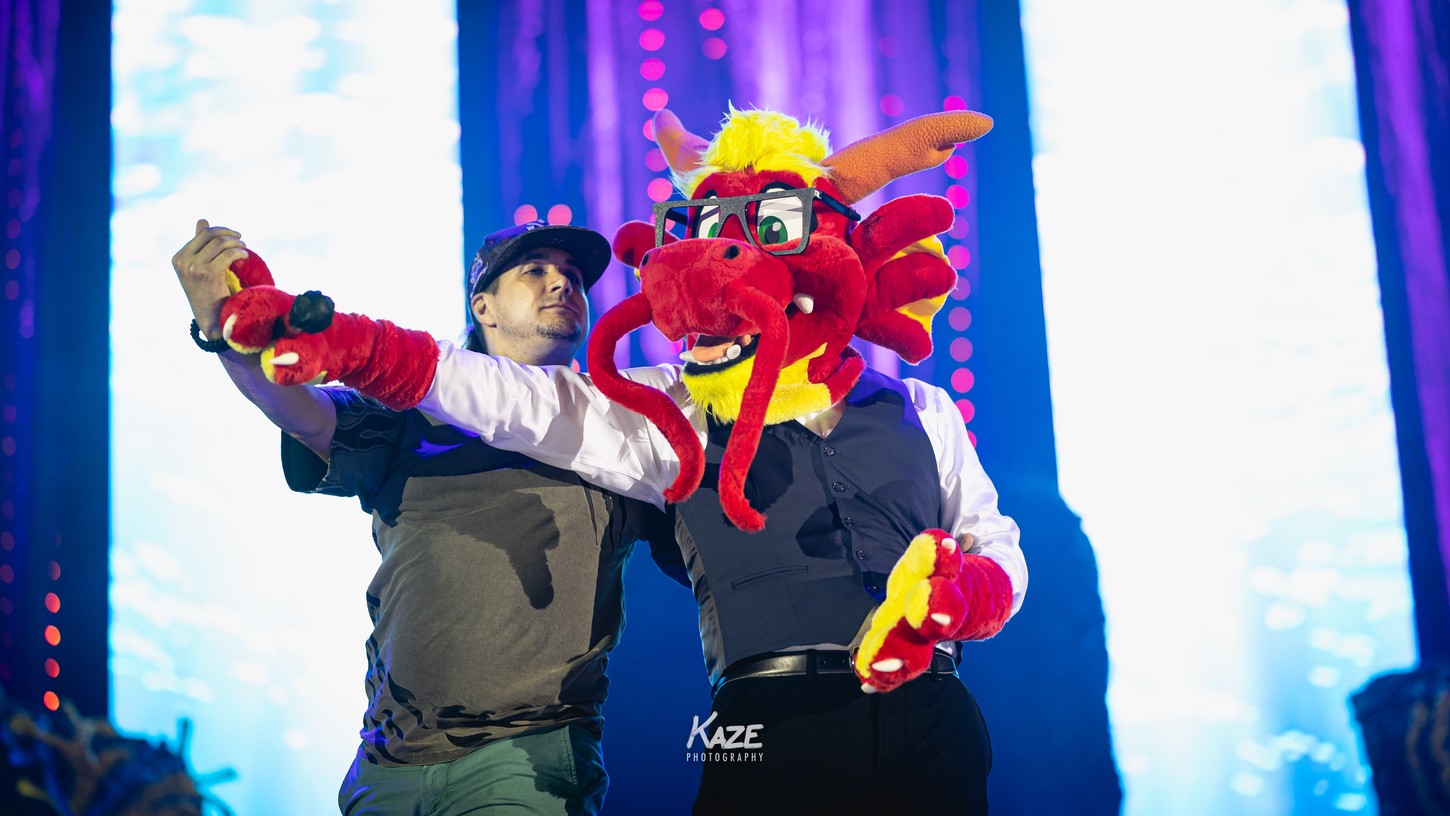 A photograph of a fursuiter dancing.