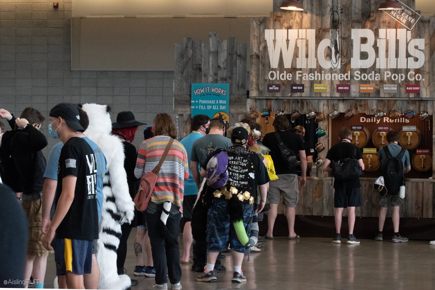 Furries standing in a line in the Dealers Room.